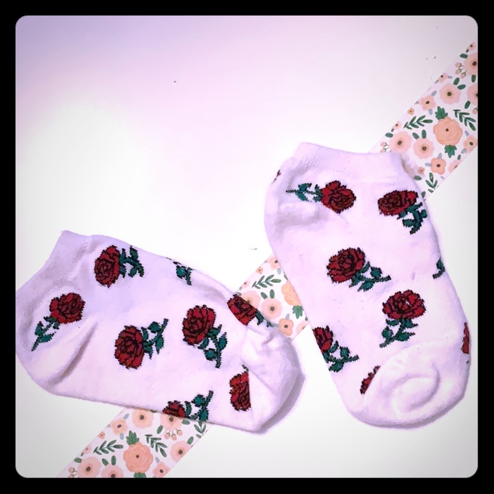 pair of white socks w/ rose prints